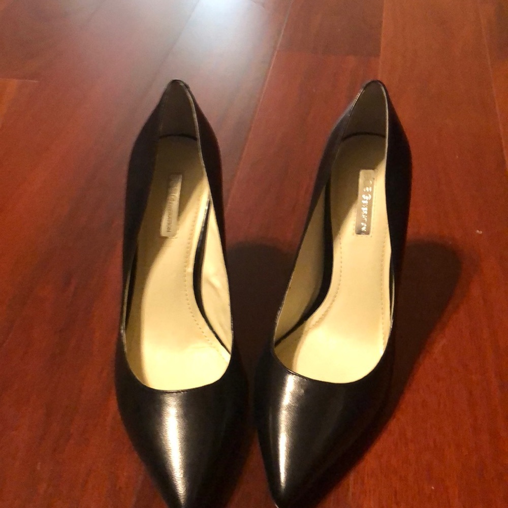 Black pointy heels